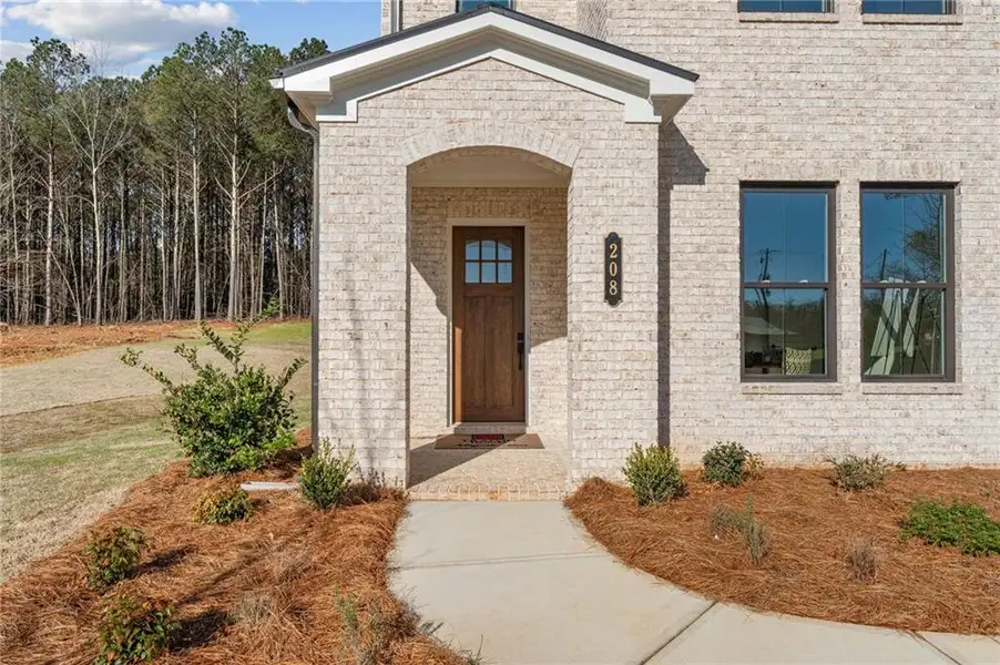 Exterior details and patio area of a home in The Reserve at Knollwood, Canton (Image 3).