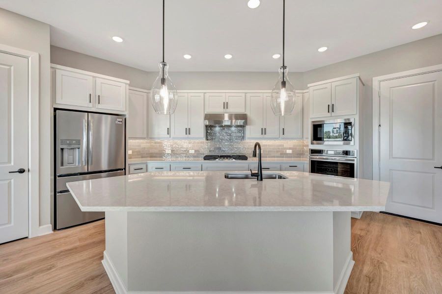 Furnished interior view inside a new home in COLTON - Reserve Collection, Todd Mission (Image 12).