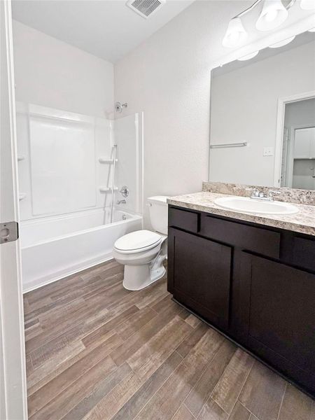 Furnished interior view inside a new home in Sierra Vista, Iowa Colony (Image 7).