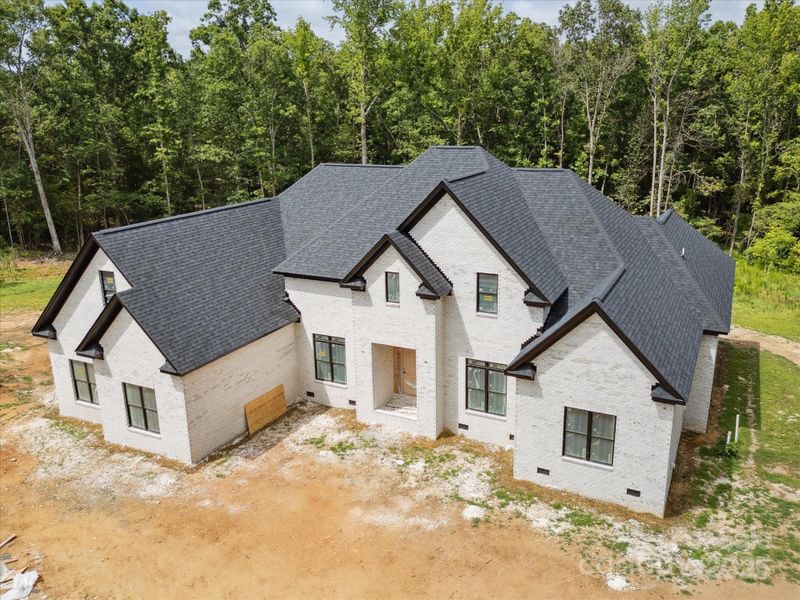 Front exterior of a new home in , Waxhaw, NC, highlighting curb appeal (Image 11).