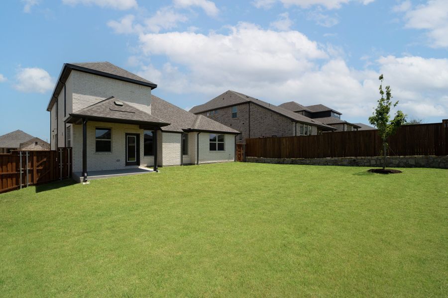 Exterior details and patio area of a home in Enclave at Legacy Hills, Celina (Image 2).