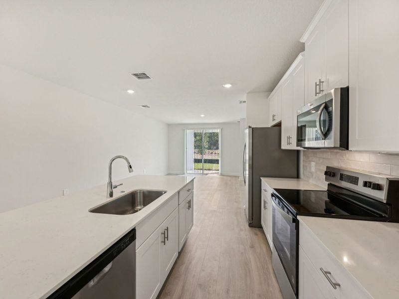 Furnished interior view inside a new home in Villamar - Classic Series, Winter Haven (Image 4).