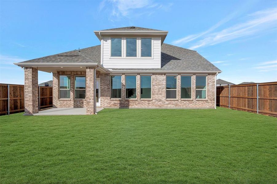 Exterior details and patio area of a home in Lily Creek at Sutton Fields, Aubrey (Image 20).