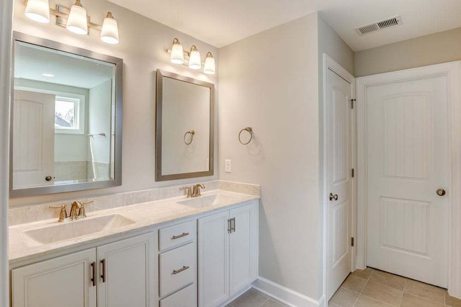 Representative furnished interior of a home built from the Brunswick by Caviness & Cates Communities in Maggie Way, Wendell (Image 62). Representative furnished interior of a home built from the Brunswick by Caviness & Cates Communities in Maggie Way, Wendell (Image 62).