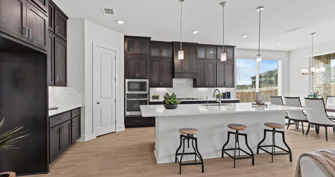 Representative furnished interior of a home built from the Waterloo by Chesmar Homes in Sunfield, Buda (Image 12).