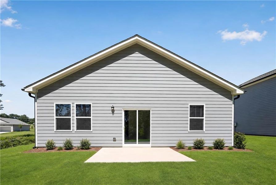 Exterior details and patio area of a home in Crossvine Village, LaGrange (Image 2).