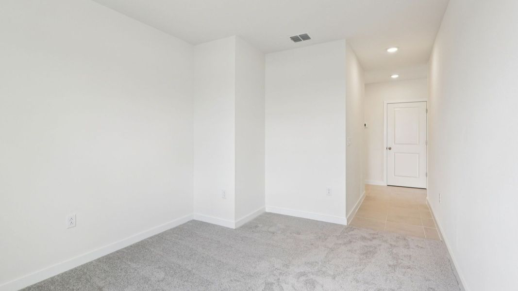Representative unfurnished interior of a home built from the Baker by DRB Homes in Liberty Trace, Haines City (Image 32).