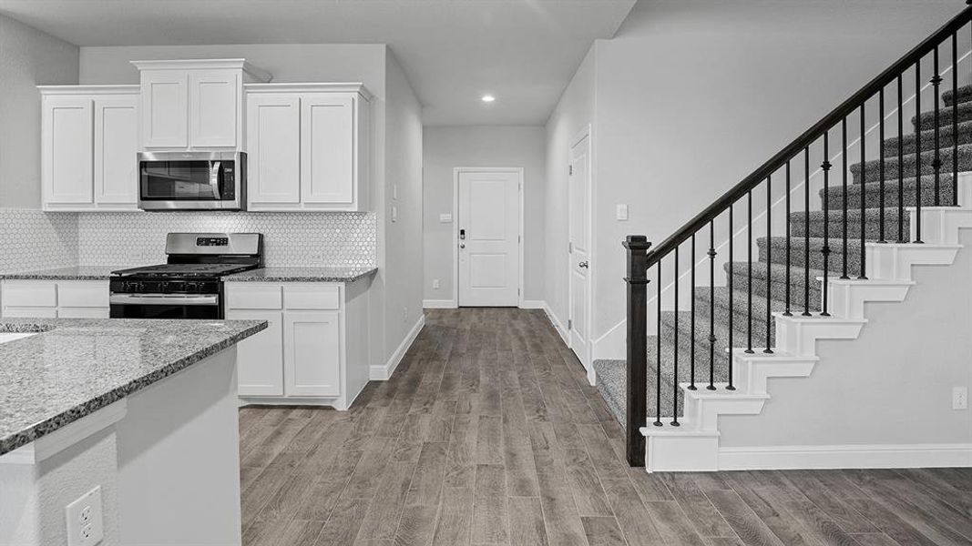 Furnished interior view inside a new home in Bluestem, Rhome (Image 12).