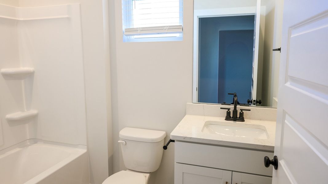 Furnished interior view inside a new home in Nexus South, Gallatin (Image 32).