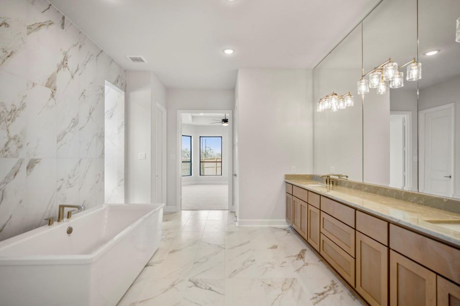 Furnished interior view inside a new home in Sienna 70′ Lots, Missouri City (Image 12).