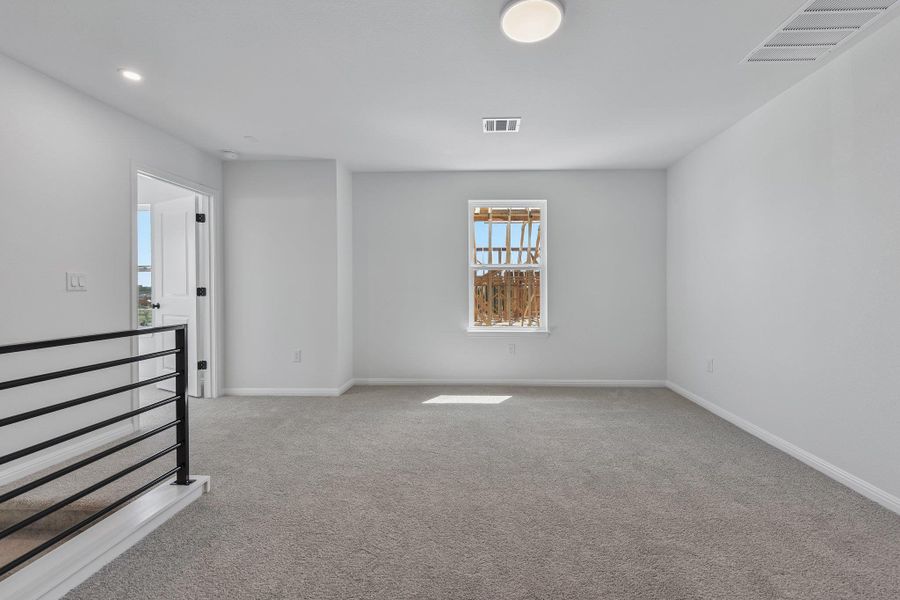 Spacious, unfurnished interior of a new home in Saddle Ridge at Wildhorse Ranch, Austin (Image 18).
