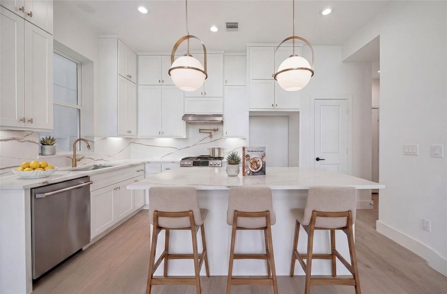 Looking at your gorgeous kitchen with Kentmore cabinets to the ceiling, GE Café appliances , Quartz countertops , luxury, lighting , gold handles and fixtures , and Beautiful soft close shaker style cabinets .