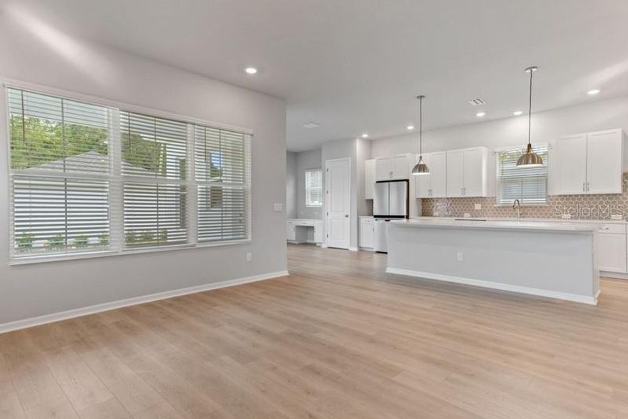 Family Room & Kitchen **Photos are of a Similar Home