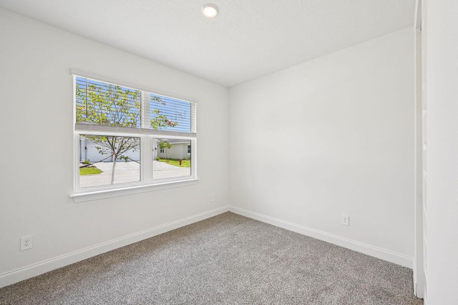 Spacious, unfurnished interior of a new home in Hampton Park - Signature Series, Vero Beach (Image 26).