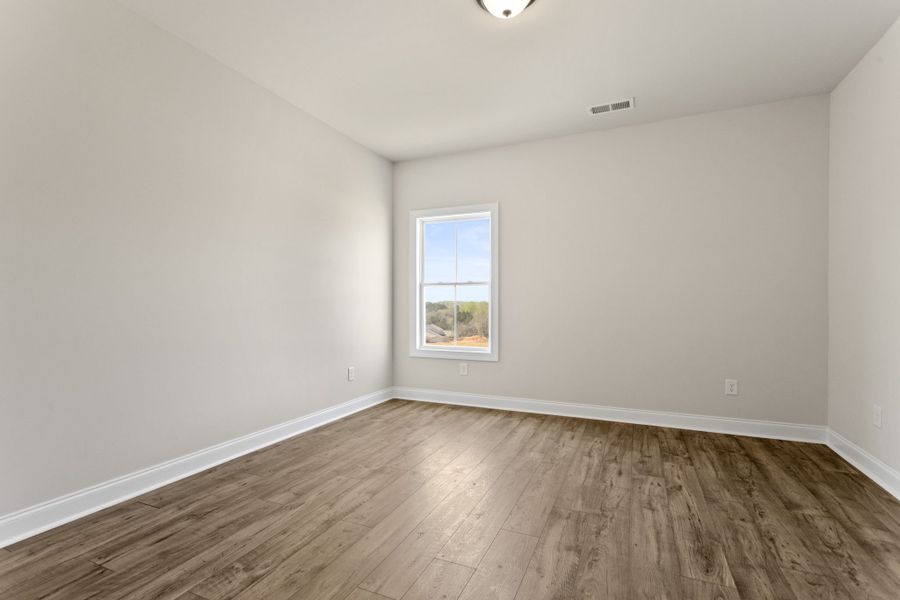 Spacious, unfurnished interior of a new home in Cherokee Knoll, Williamston (Image 18).
