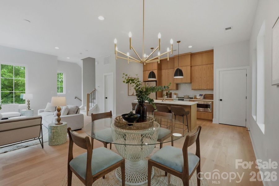 Dining area open to living room and kitchen.