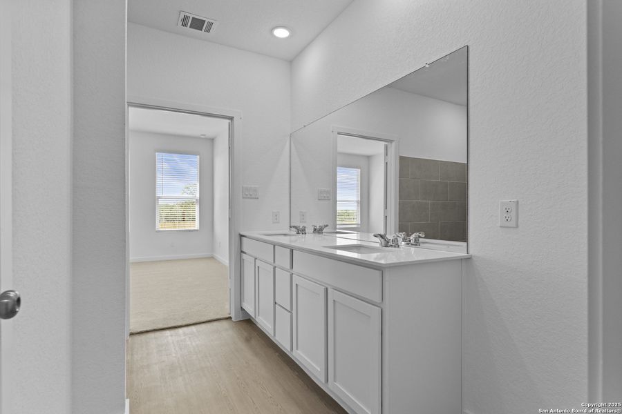 Furnished interior view inside a new home in Hidden Trails: Coastline Collection, Bulverde (Image 4).