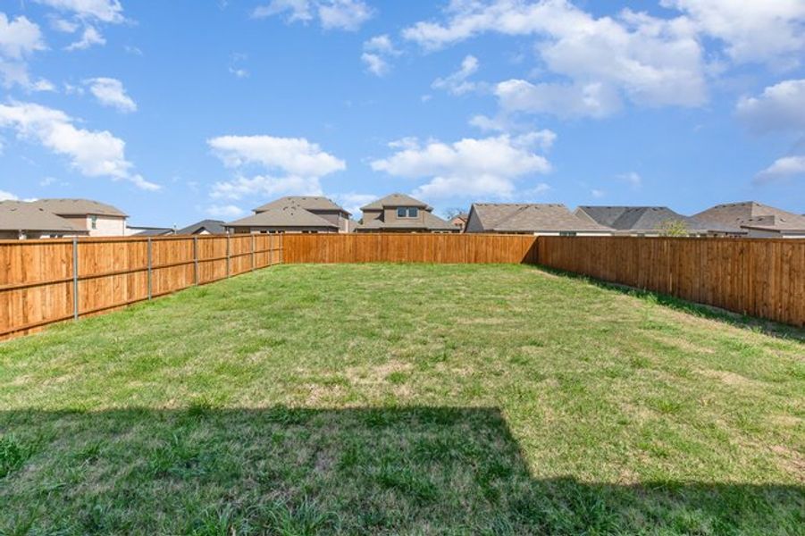 Exterior details and patio area of a home in Courts Of Bonnie Brae, Denton (Image 19).