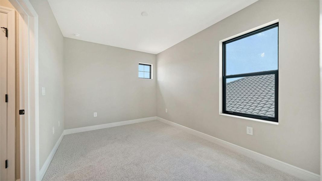 Spacious, unfurnished interior of a new home in Windward Real Estate and Homes for Sale in Sarasota, FL - Neal Communities, Lakewood Ranch (Image 45).