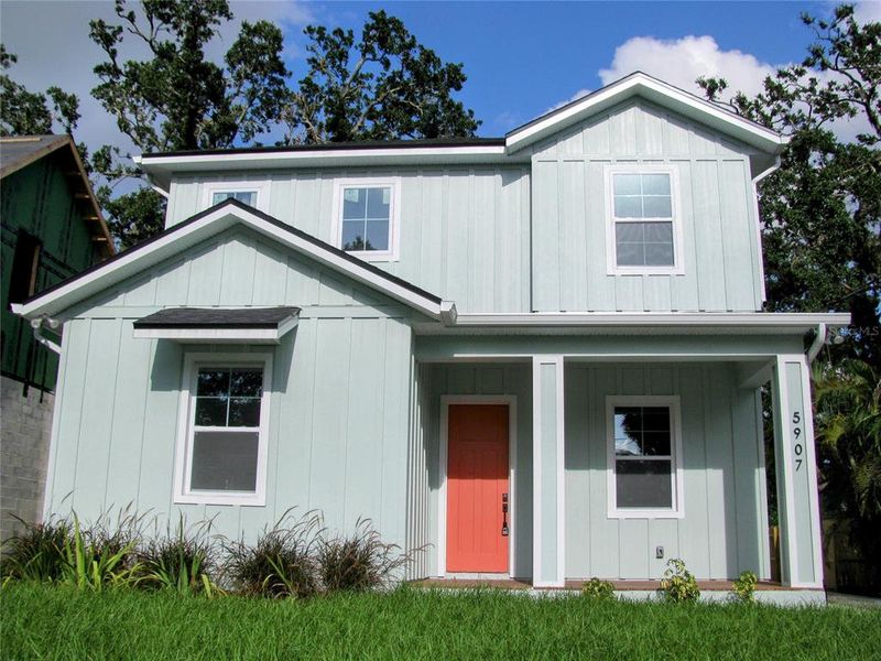 Front exterior of a new home in , Tampa, FL, highlighting curb appeal (Image 8).
