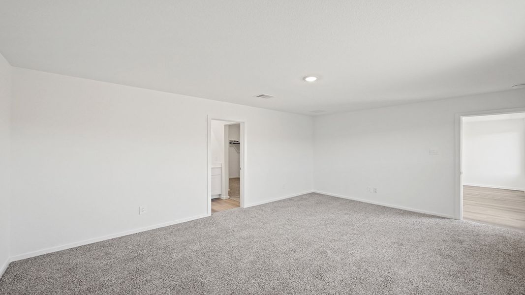 Representative unfurnished interior of a home built from the Carson by D.R. Horton in Lexington Heights, Willis (Image 28).