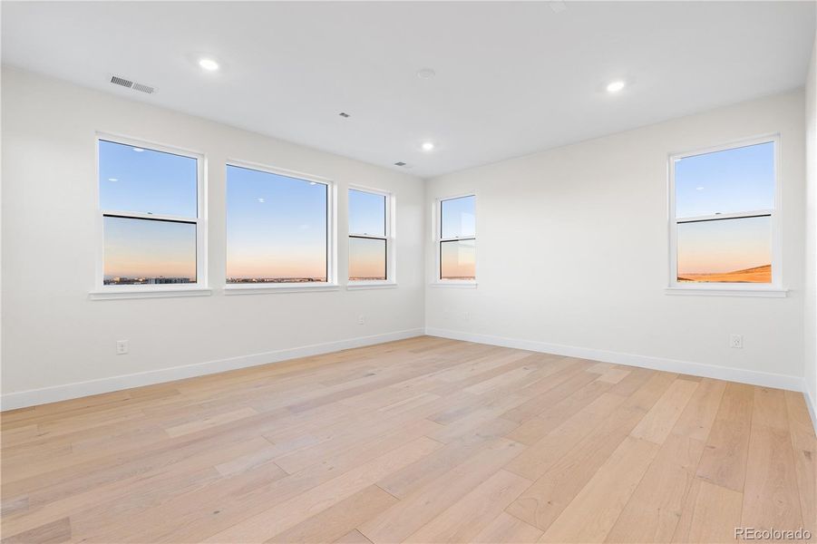 Spacious, unfurnished interior of a new home in Autograph at Lyric, Lone Tree (Image 36).