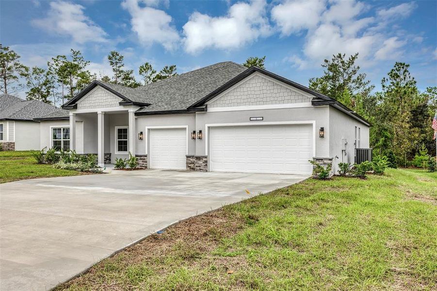 Front exterior of a new home in , Homosassa, FL, highlighting curb appeal (Image 1). Front exterior of a new home in , Homosassa, FL, highlighting curb appeal (Image 1).