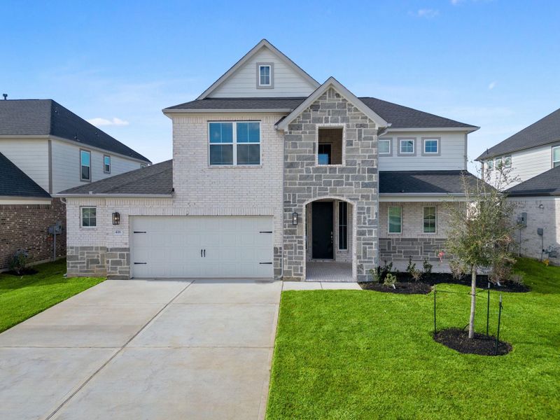 Front exterior of a new home in Beacon Hill, Waller, TX, highlighting curb appeal (Image 13).