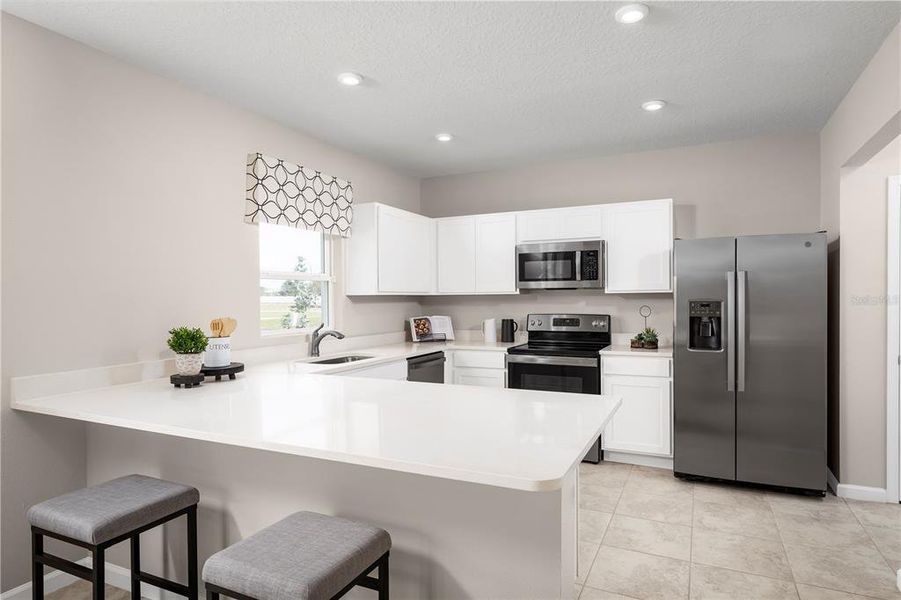 Furnished interior view inside a new home in Crystal Lake Preserve, Dundee (Image 3).