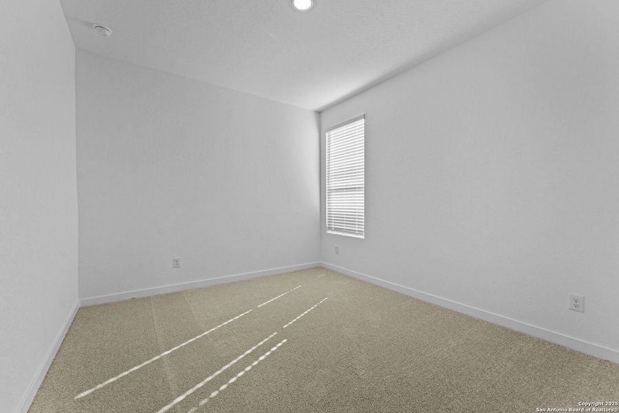 Spacious, unfurnished interior of a new home in Waterwheel: Coastline Collection, San Antonio (Image 27).