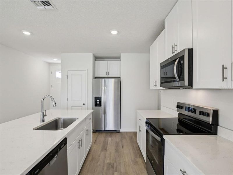 Furnished interior view inside a new home in Leyland Preserve - Premier Series, Brooksville (Image 3). Furnished interior view inside a new home in Leyland Preserve - Premier Series, Brooksville (Image 3).