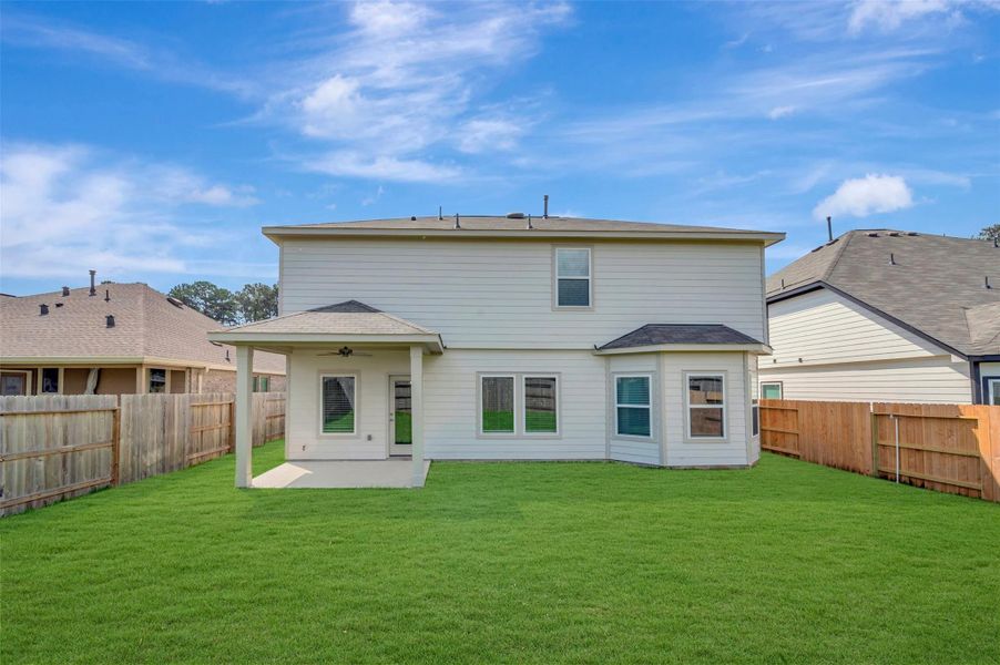 Exterior details and patio area of a home in Moran Ranch, Willis (Image 23).