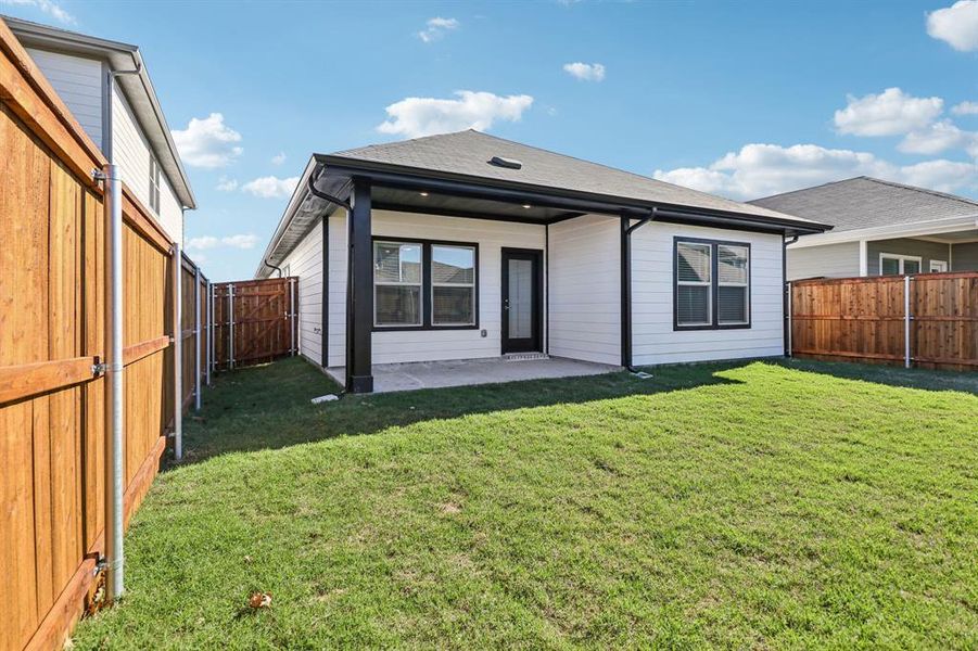 Exterior details and patio area of a home in Lakehaven - Spring Series, Farmersville (Image 25).
