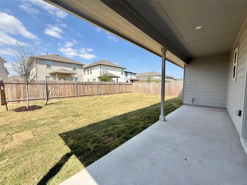 Exterior details and patio area of a home in Porter Country, Buda (Image 2).