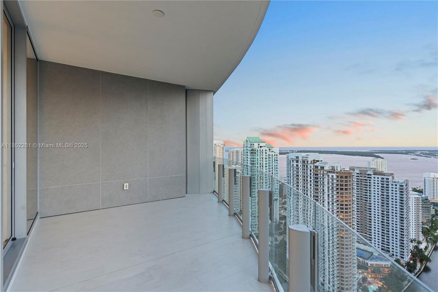 Exterior details and patio area of a home in Aston Martin Residences, Miami (Image 18).