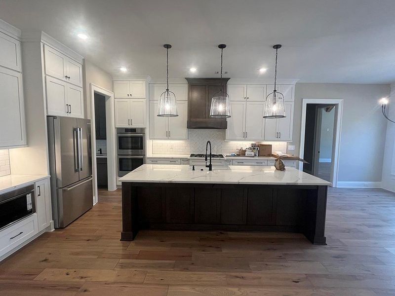Furnished interior view inside a new home in , White (Image 18).