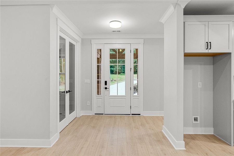 Enter into a bright, open space featuring light-to Enter into a bright, open space featuring light-to