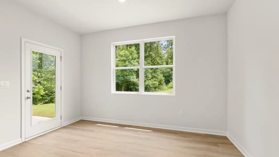 Representative unfurnished interior of a home built from the Darwin by D.R. Horton in Oaks at Cedar Grove, Fairburn (Image 13).