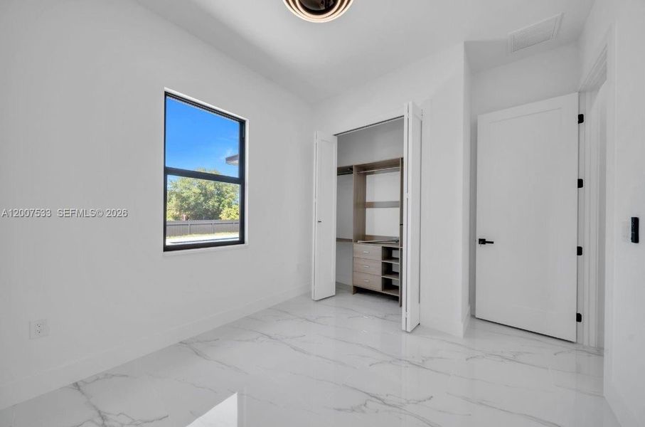 Spacious, unfurnished interior of a new home in , Lehigh Acres (Image 10). Spacious, unfurnished interior of a new home in , Lehigh Acres (Image 10).