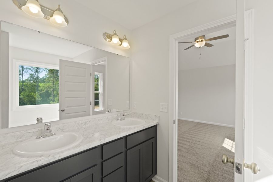 Representative furnished interior of a home built from the The Anderson by RTS Homes in Doctor's Creek, Ludowici (Image 14).