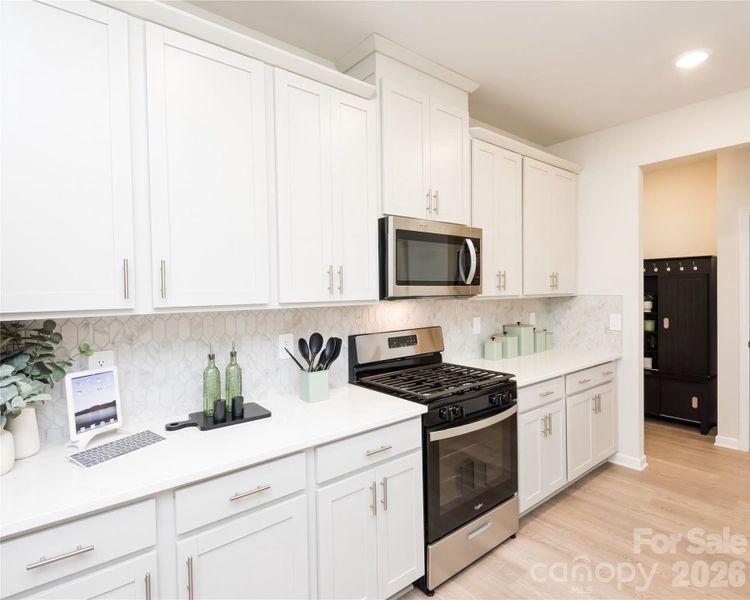 Photo is not of the actual home, but is an inspirational photo of builder’s model home and may depict options, furnishings, and/or decorator features that are not included