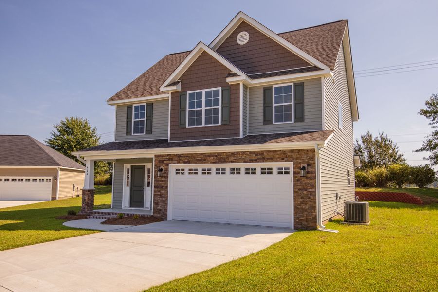 Front exterior of a home in the Davenport Farms community, located in Winterville, NC (Image 9).