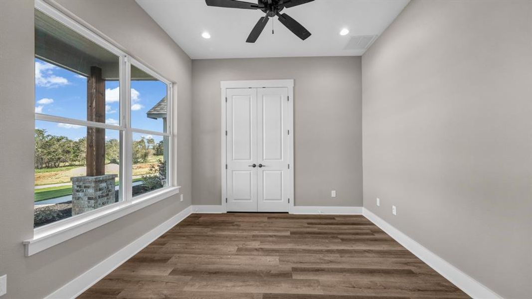 Bonus Room with a closet, ceiling fan, and wooden french doors