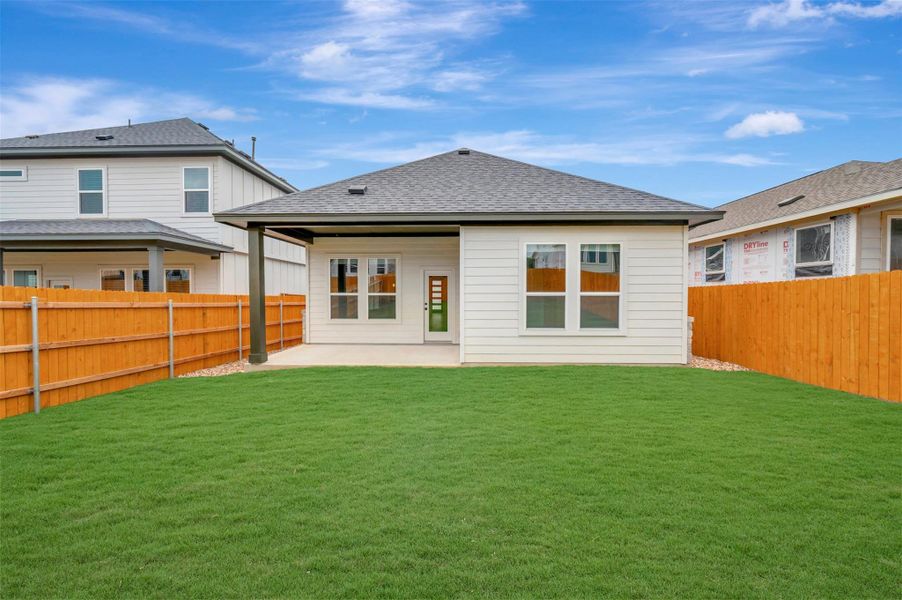 Exterior details and patio area of a home in Heritage, Dripping Springs (Image 4).