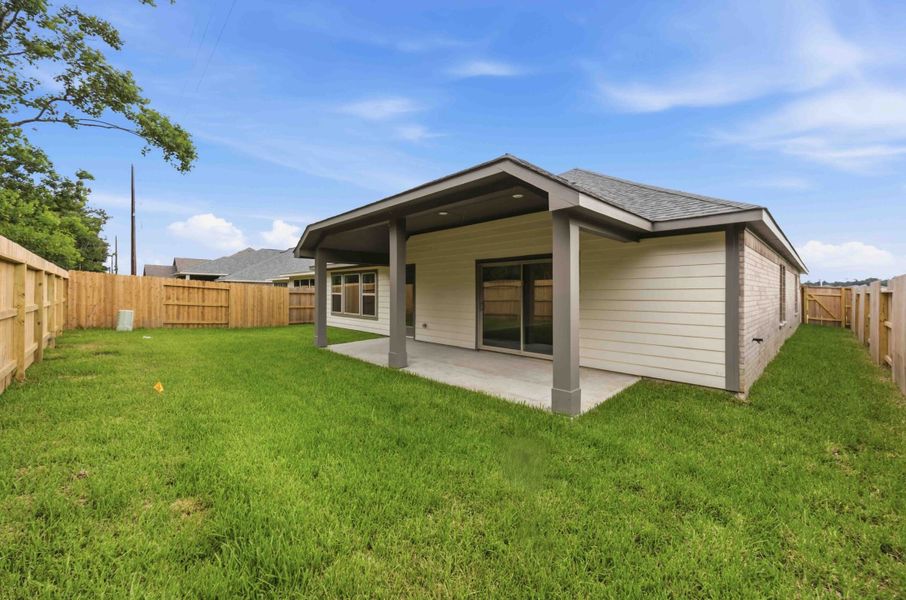 Exterior details and patio area of a home in Sundance Cove, Crosby (Image 3).