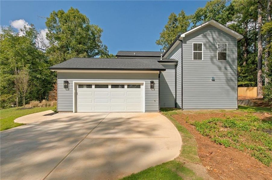 Front exterior of a new home in , Atlanta, GA, highlighting curb appeal (Image 27).