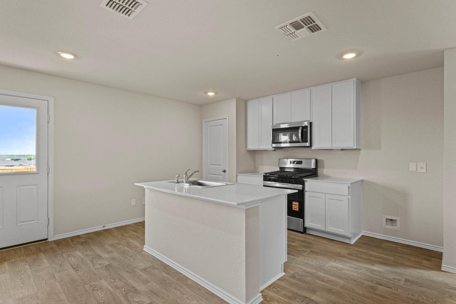 Furnished interior view inside a new home in Avenida, Converse (Image 7).