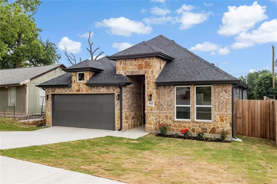 Stone and brick façade with herringbone pattern accents
