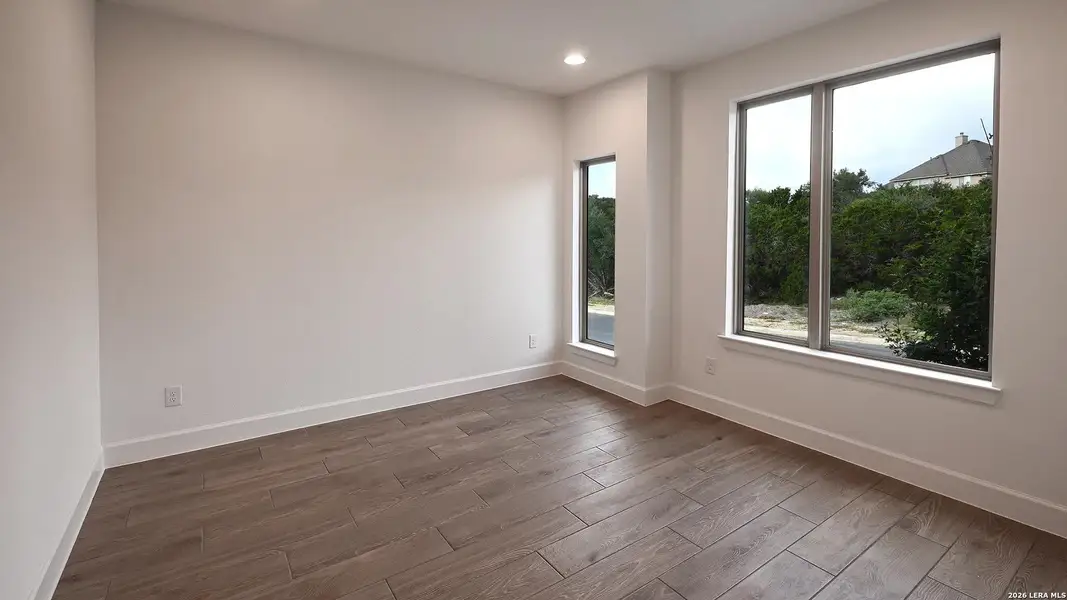 Spacious, unfurnished interior of a new home in Hidden Canyon, San Antonio (Image 16).