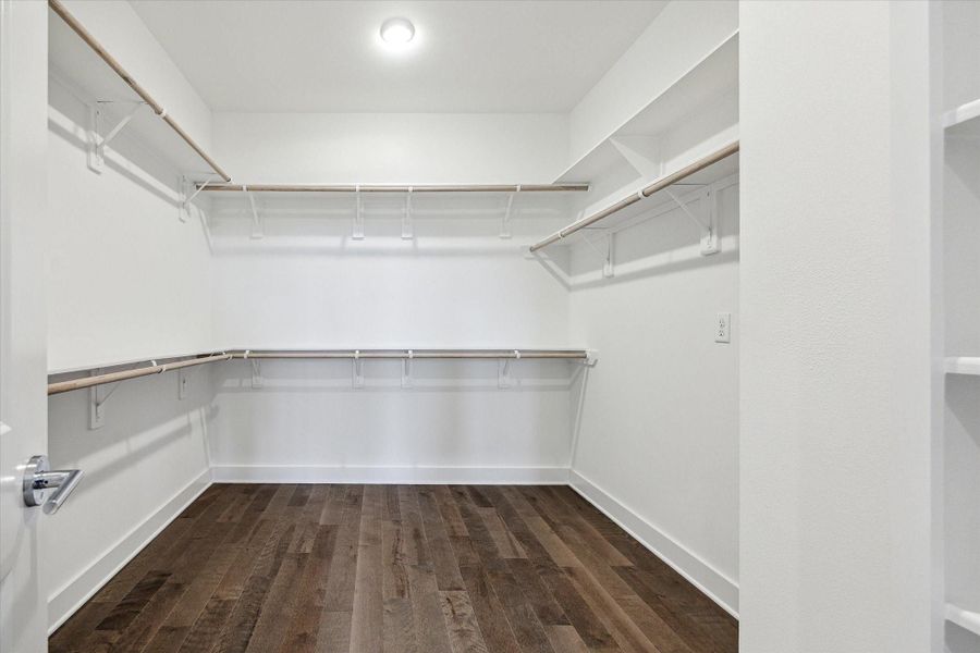 Primary Bedroom's Walk In Closet.